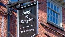 The Angel @ King Street Sign hanging from the wall