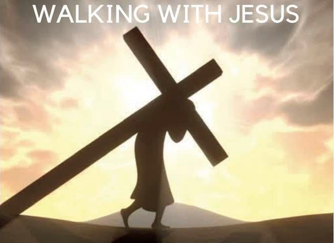 Jesus Christ walking with a cross, and the text "Walking with Jesus"