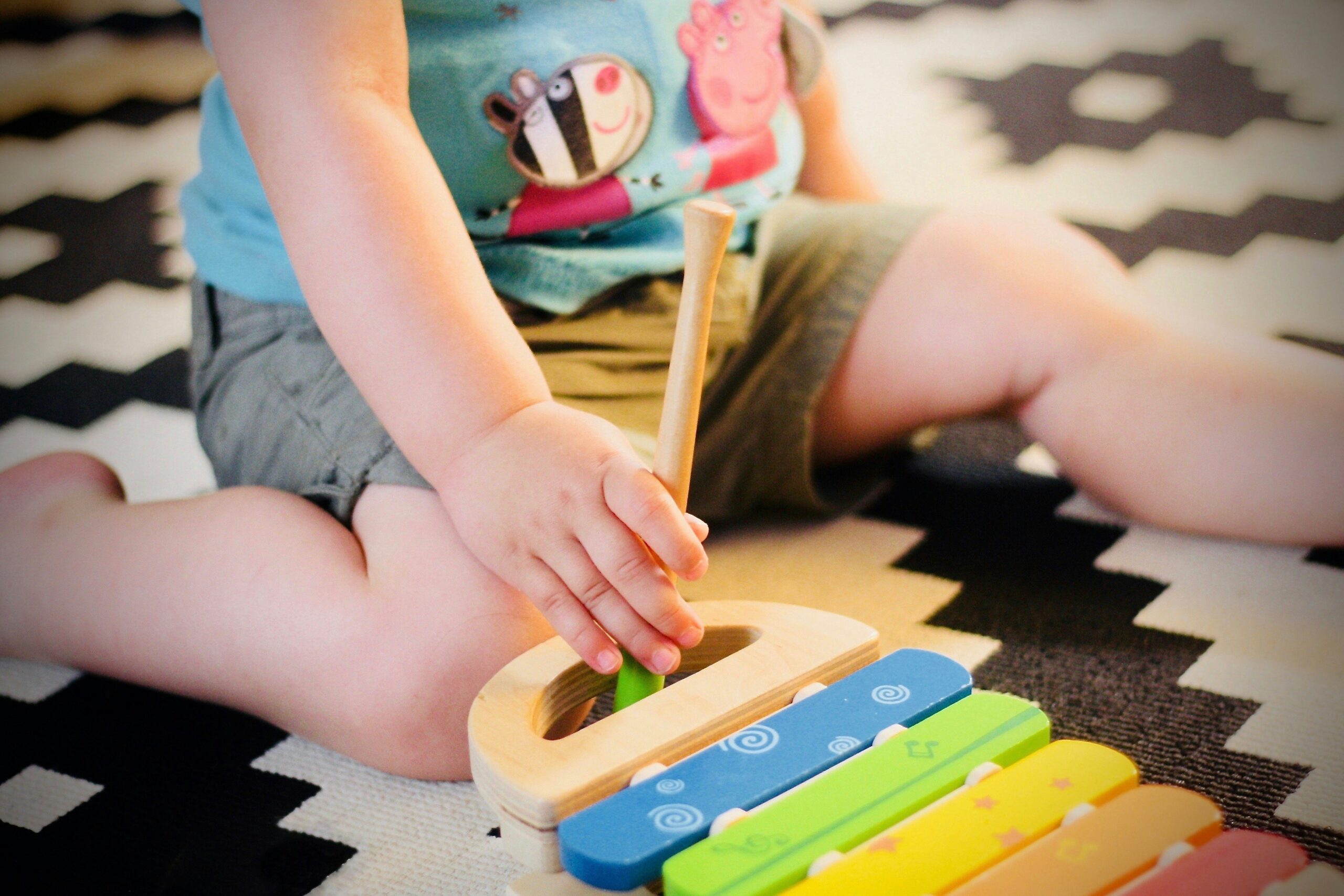 Baby playing xylophone music